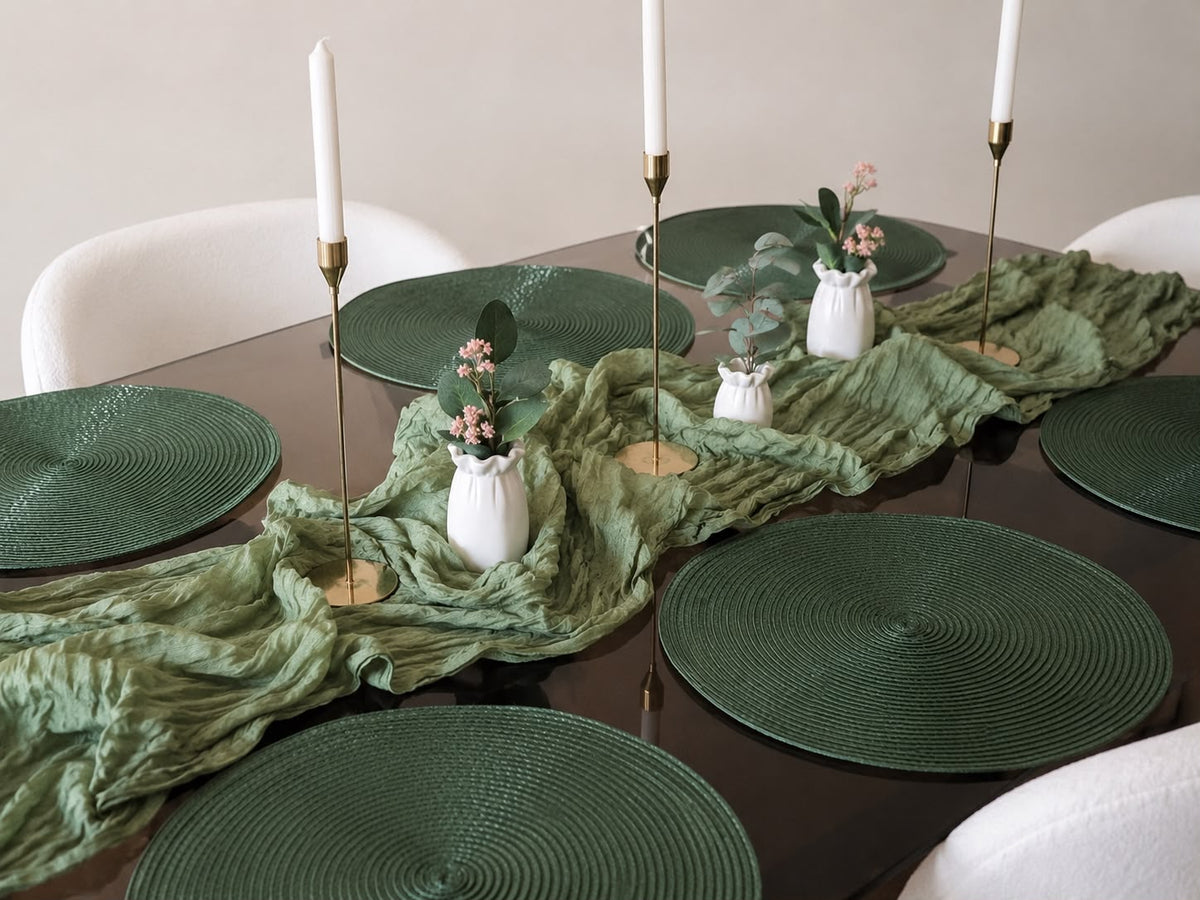 Table Set Saga Green – overhead view with candles and white vases
