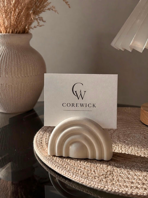 Arch Card & Photo Holder in matte cream finish displaying a CoreWick business card