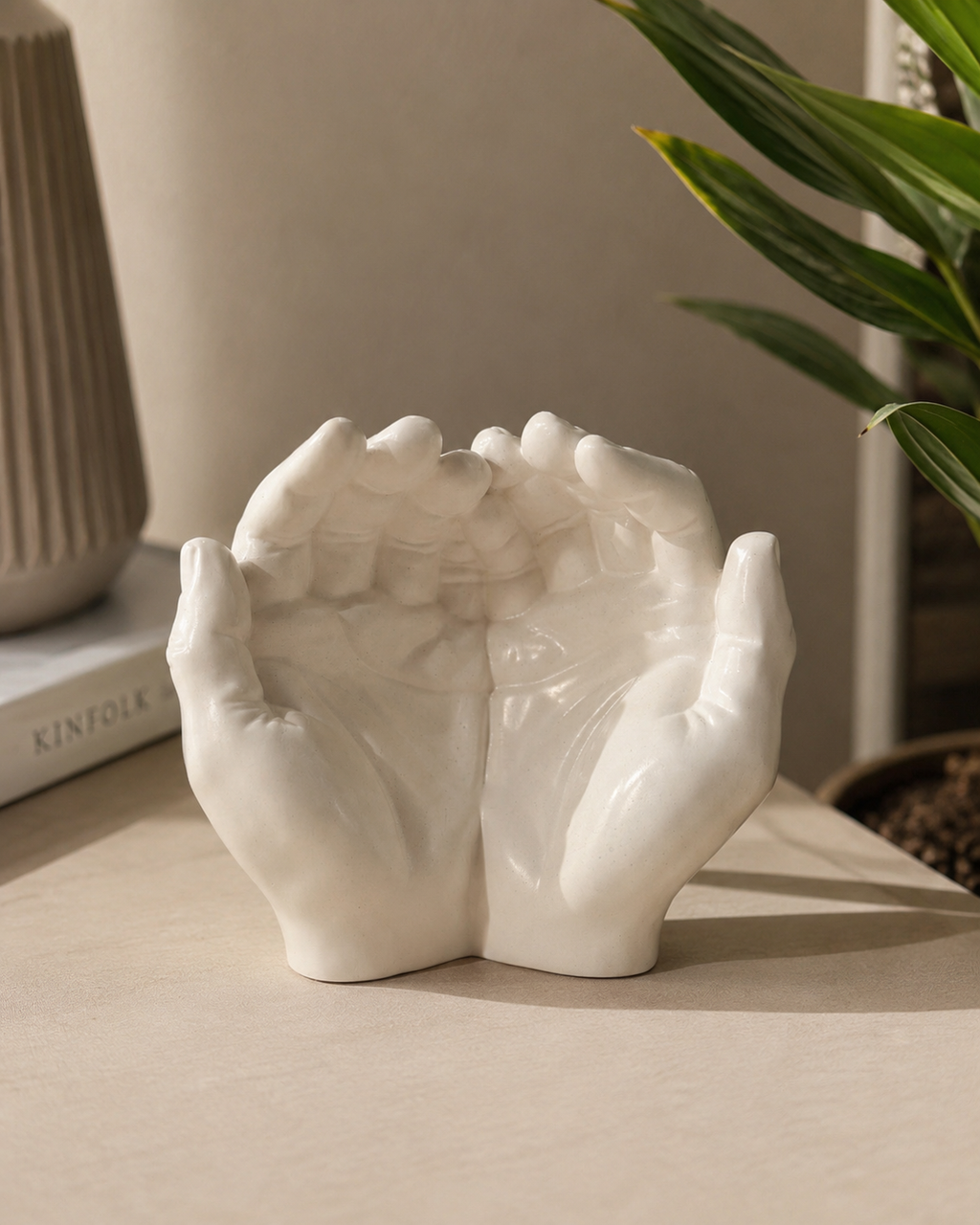 The Giving Hands duo cupped hands sculpture